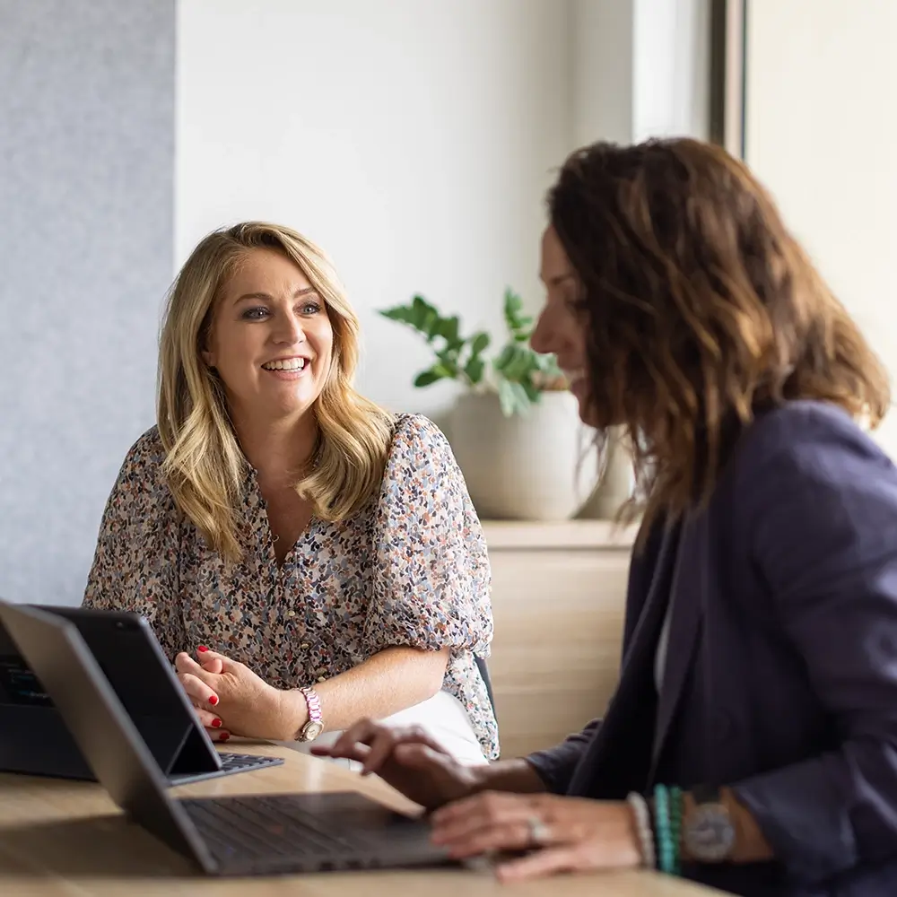 Tammy Barton, Founder & Director of MyBudget and a team member Danielle discussing MyBudget's world class budgeting service in New Zealand.