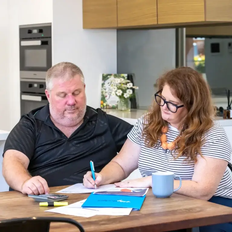MyBudget clients Alyssa and Pete managing bills with a financial checklist for automated debt management plan and budget planning in New Zealand.